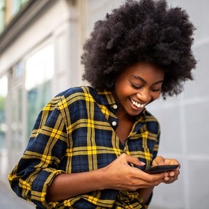 Lady on phone with afro